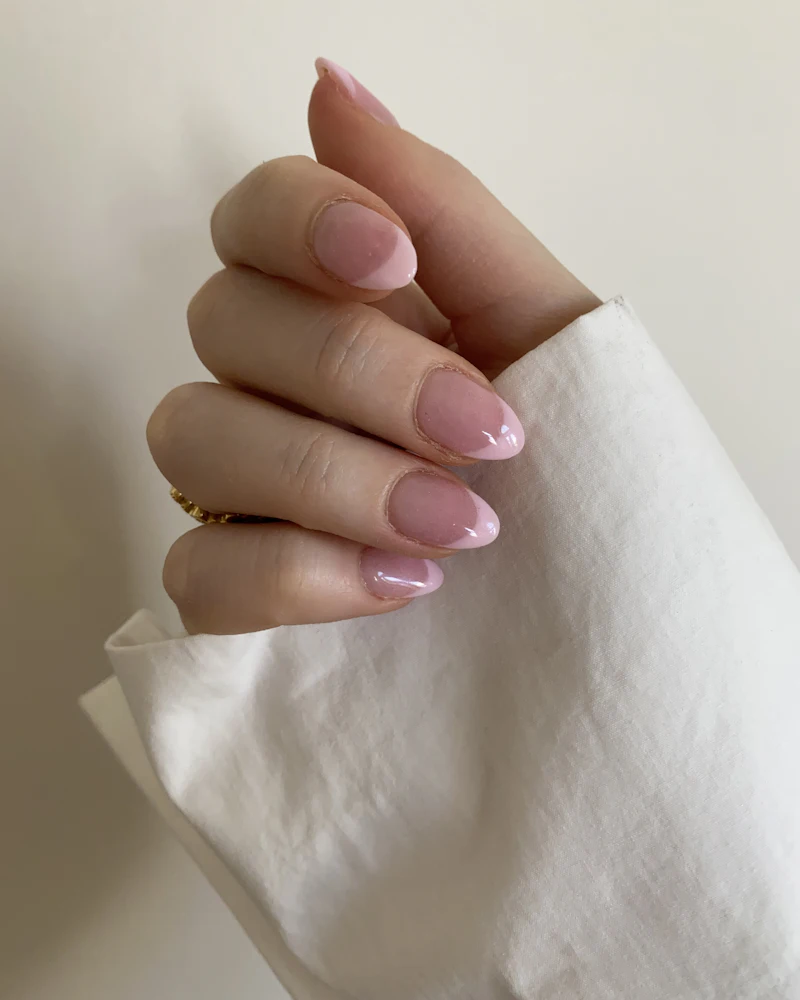 French tip nail extensions done by a student at Finenticee Academy, Bhubaneswar